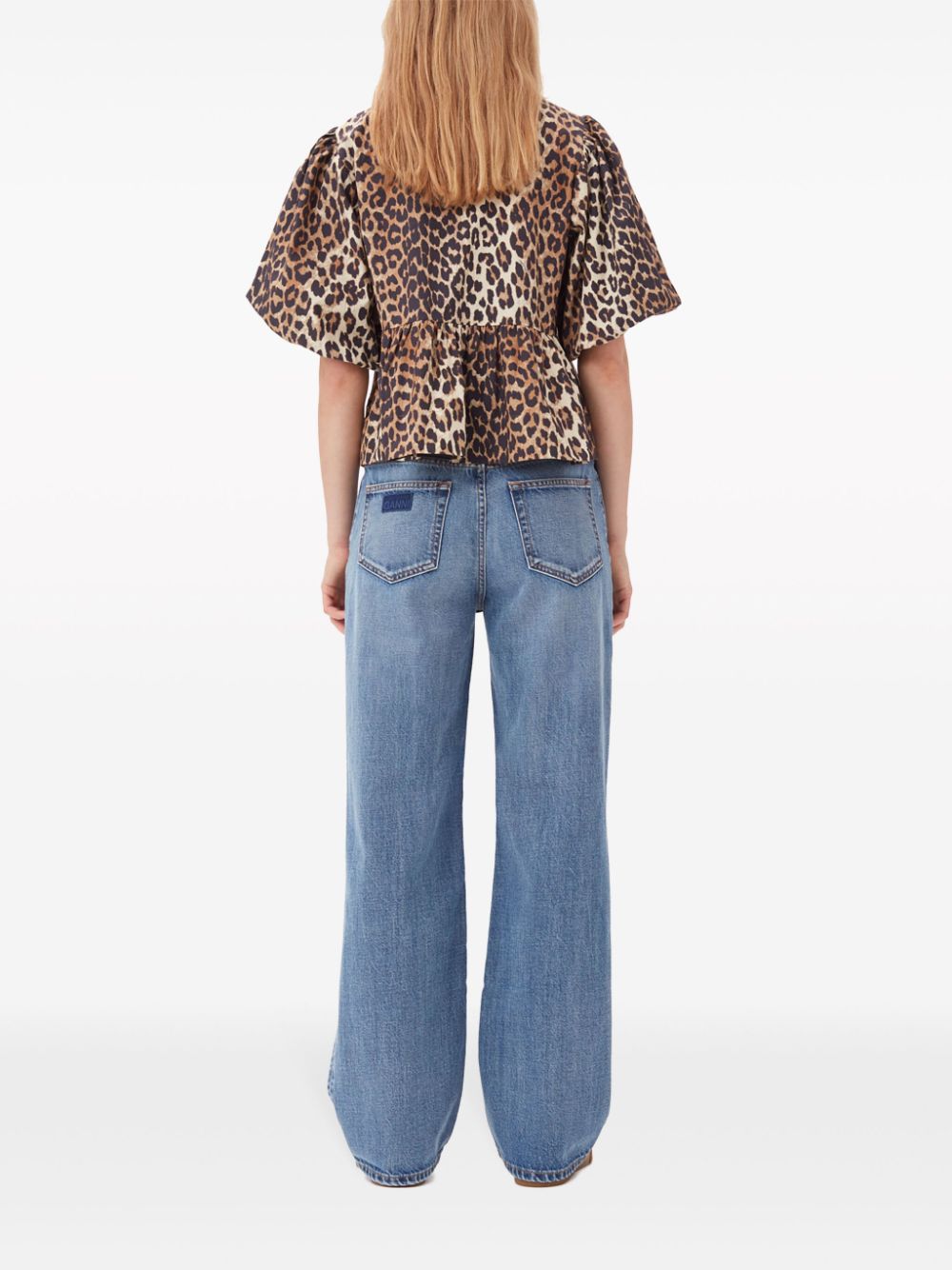 Ganni Conscious Criteria page Organic cotton peplum top Ganni